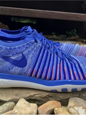 Nike Blue Flyknit Training Sneakers with Coral Accents